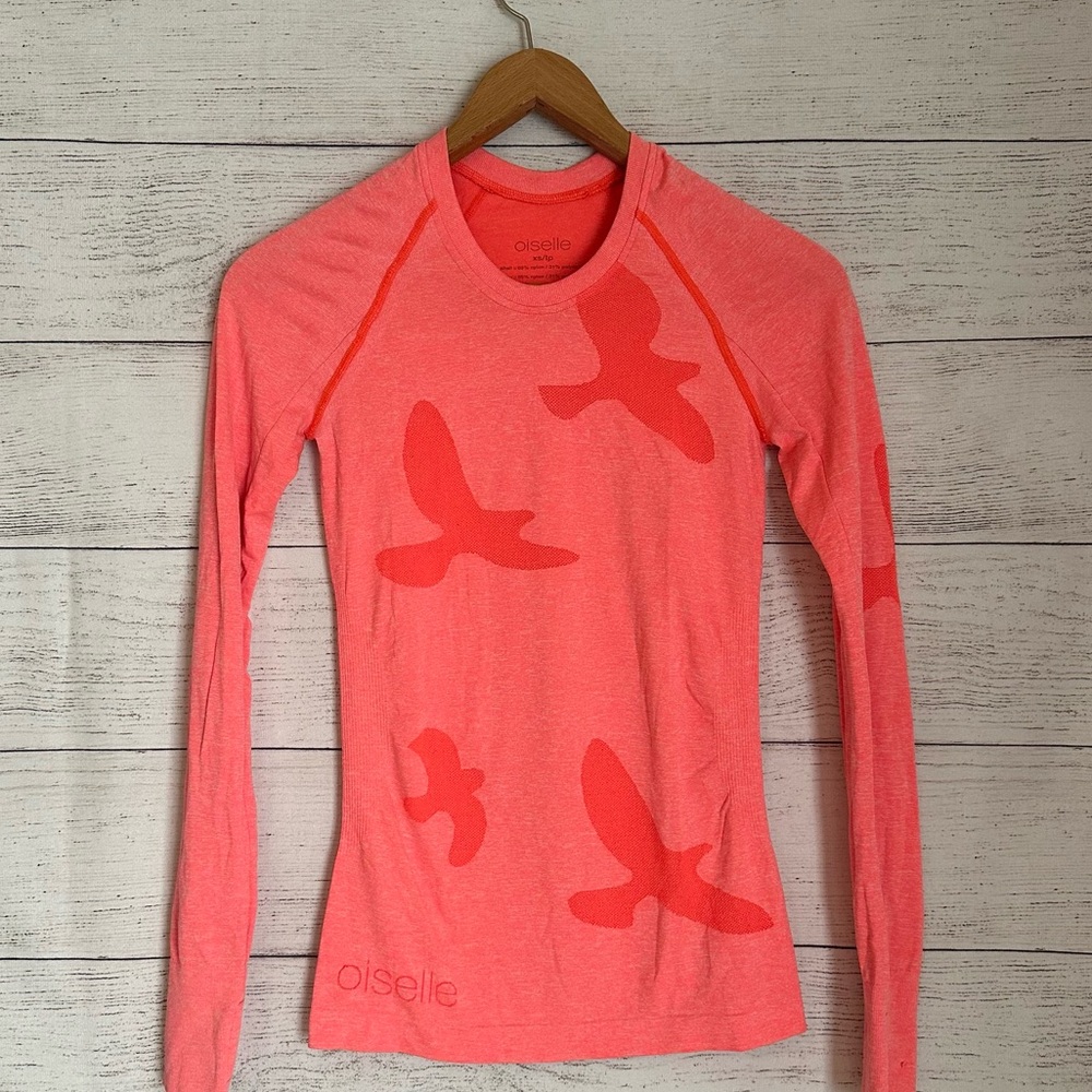 Oiselle Wing Out Fitted Long Sleeve Top in Bright Coral.